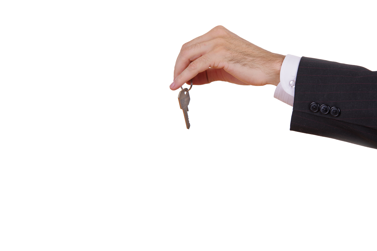 Hand mit Schlüssel