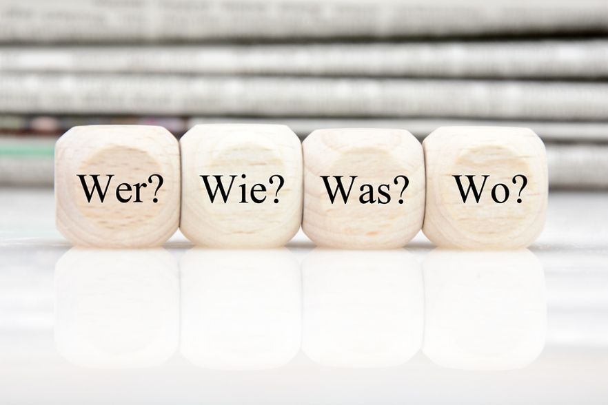 W&uuml;rfel mit der Aufschrift Wer? Wie? Was? Wo?
