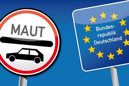 Ein Schild mit dem Wort &bdquo;Maut" und einem Autosymbol und ein blaues Schild &bdquo;Bundesrepublik Deutschland" mit gelben Sternen