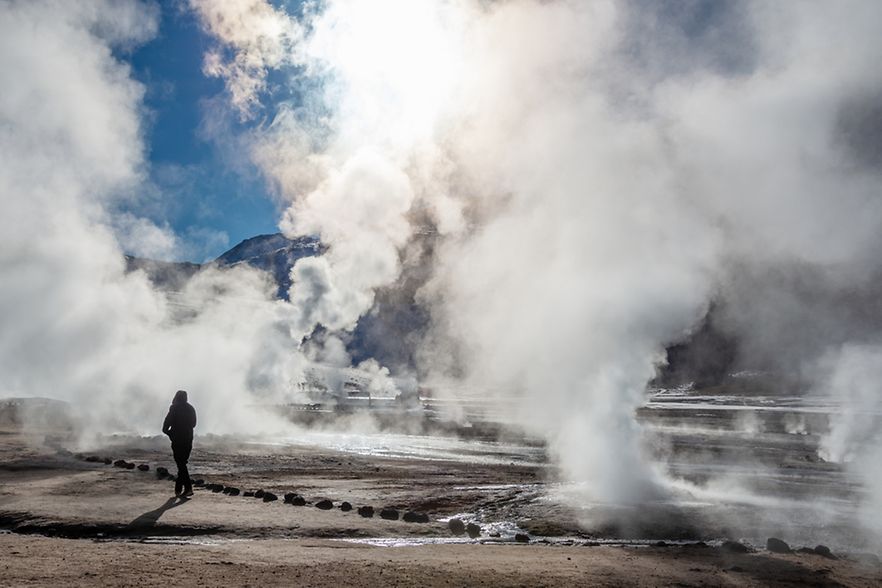 El,Tatio,Geysers,In,Chile,,Silhouette,Of,A,Woman,Walking