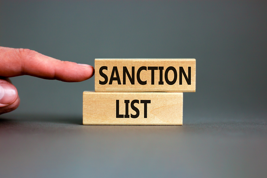 Holzklötze mit Aufschrift Saktions List