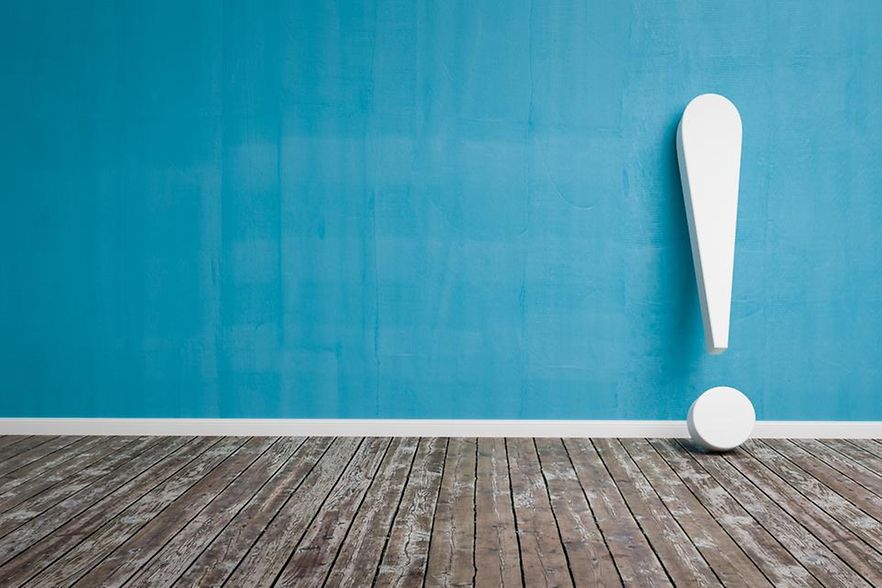 White exclamation mark on wooden floor and concrete wall 3D Illustration Warning Concept