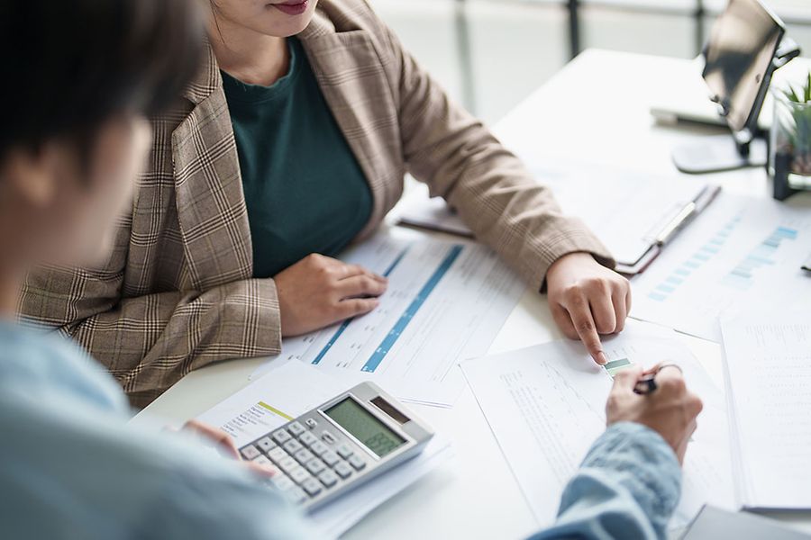 business man Auditor or internal revenue service staff checking annual financial statements company Audit Â Accounting tax.