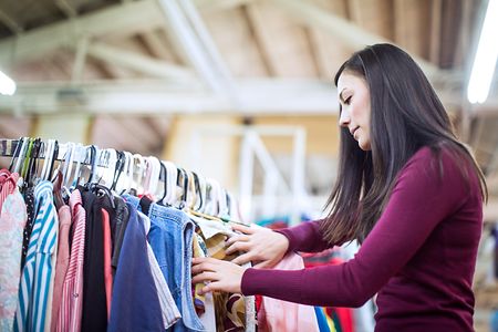 Thrift Store Shopping Young Woman