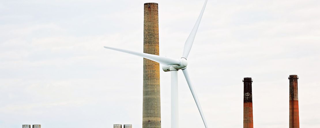 windmill near a factory