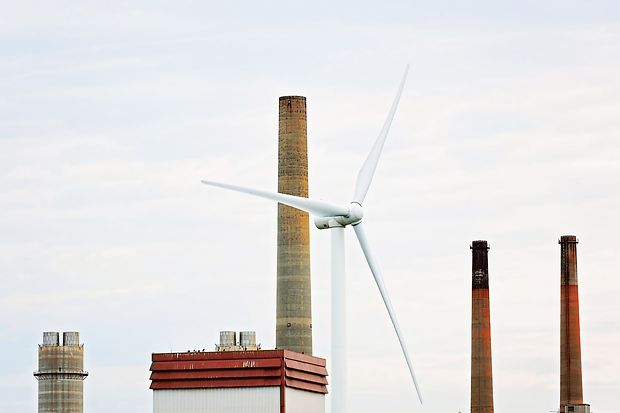 windmill near a factory